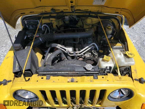 2004 Jeep Wrangler Sport with VIN 1J4FA49S84P753317, listed as a Copart auction lot 55872965 with 185,763 mi miles and Salvage title. Bid and sale history available at DreamBid. Image 12.