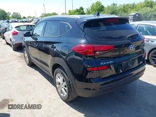 2019 Hyundai Tucson Value with VIN KM8J3CA46KU935335, listed as a IAAI auction lot 42296162 with 65,099 mi miles and . Bid and sale history available at DreamBid. Image 3.