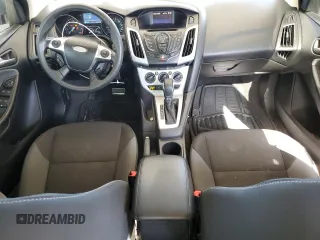 2012 Ford Focus SE with VIN 1FAHP3F29CL161559, listed as a Copart auction lot 61695575 with 127,412 mi miles and Salvage title. Bid and sale history available at DreamBid. Image 8.