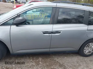 2016 Honda Odyssey LX with VIN 5FNRL5H23GB028338, listed as a IAAI auction lot 41980064 with 186,403 mi miles and . Bid and sale history available at DreamBid. Image 14.
