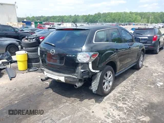 2010 Mazda CX-7 Touring z VIN JM3ER2W30A0341657, wystawiony jako IAAI lot #42123453 z przebiegiem 173 135 mil mil oraz . Historia ofert i sprzedaży dostępna na DreamBid. Obrazek 4.