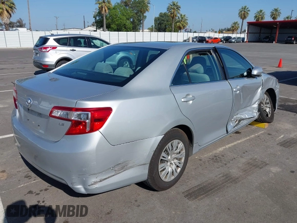 2014 Toyota Camry L with VIN 4T4BF1FK5ER442960, listed as a IAAI auction lot 42206639 with 119,639 mi miles and . Bid and sale history available at DreamBid. Image 4.