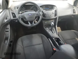 2016 Ford Focus SE with VIN 1FADP3F22GL233402, listed as a Copart auction lot 60854175 with 77,002 mi miles and Salvage title. Bid and sale history available at DreamBid. Image 8.