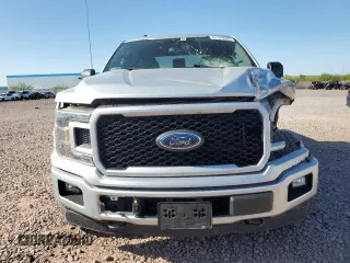 2019 Ford F-150 XL with VIN 1FTEW1EPXKKD82772, listed as a Copart auction lot 61176535 with 121,067 mi miles and Salvage title. Bid and sale history available at DreamBid. Image 5.
