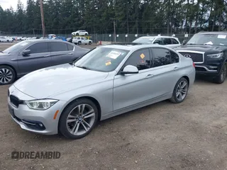 2017 BMW 3 Series 330i xDrive with VIN WBA8D9G33HNU64889, listed as a IAAI auction lot 41626253 with 66,520 mi miles. Bid and sale history available at carsss.com. Image 2.