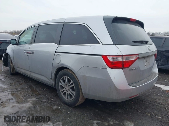2013 Honda Odyssey EX-L with VIN 5FNRL5H63DB007682, listed as a IAAI auction lot 41408103 with 201,453 mi miles and . Bid and sale history available at carsss.com. Image 3.