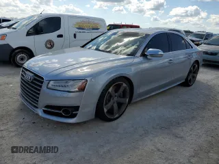 2015 Audi S8 with VIN WAUK2AFD6FN011936, listed as a Copart auction lot 74001664 with 0 mi miles and Salvage Title. Bid and sale history available at carsss.com. Image 1.