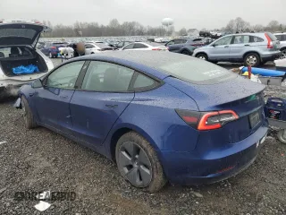 2021 Tesla Model 3 Long Range with VIN 5YJ3E1EB6MF923931, listed as a Copart auction lot 51829505 with 45,389 mi miles and Salvage Title. Bid and sale history available at carsss.com. Image 2.