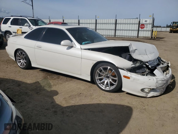 1998 Lexus SC 400 z VIN JT8CH32Y9W1001434, wystawiony jako Copart lot #44635385 z przebiegiem 125 440 mil mil oraz Szkoda całkowita • Salvage title. Historia ofert i sprzedaży dostępna na DreamBid. Obrazek 4.
