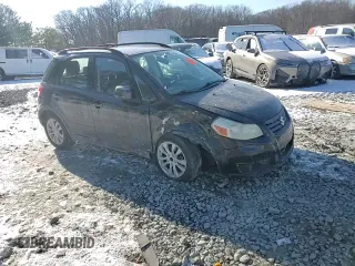 2013 Suzuki SX4 Crossover z VIN JS2YB5A39D6100013, wystawiony jako Copart lot #42423105 z przebiegiem 167 398 mil mil oraz Szkoda całkowita • Salvage title. Historia ofert i sprzedaży dostępna na DreamBid. Obrazek 11.
