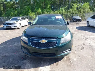 2014 Chevrolet Cruze LS with VIN 1G1PA5SG7E7441375, listed as a IAAI auction lot 42031209 with 104,720 mi miles. Bid and sale history available at carsss.com. Image 6.