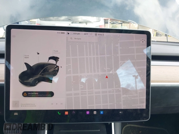 2019 Tesla Model 3 Mid Range with VIN 5YJ3E1EA4KF305611, listed as a IAAI auction lot 41916738 with 59,101 mi miles and . Bid and sale history available at carsss.com. Image 18.