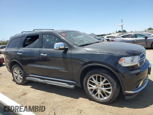 2014 Dodge Durango Citadel with VIN 1C4RDJEG5EC394396, listed as a Copart auction lot 61416305 with 185,730 mi miles and Salvage title. Bid and sale history available at DreamBid. Image 4.