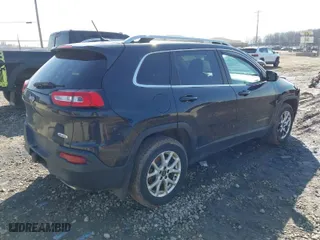 2015 Jeep Cherokee Latitude with VIN 1C4PJMCS9FW577440, listed as a IAAI auction lot 41707489 with 159,838 mi miles. Bid and sale history available at carsss.com. Image 4.