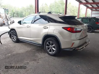 2019 Lexus RX 350 with VIN JTJBZMCA2K2039042, listed as a IAAI auction lot 42469481 with 84,794 mi miles and . Bid and sale history available at DreamBid. Image 3.