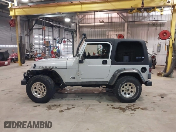 2003 Jeep Wrangler Rubicon with VIN 1J4FA69S13P375142, listed as a IAAI auction lot 41709647 with 125,443 mi miles and . Bid and sale history available at DreamBid. Image 15.