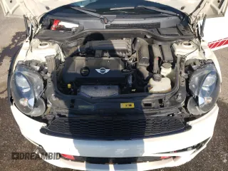 2012 MINI Hardtop with VIN WMWSU3C53CT369974, listed as a Copart auction lot 53238895 with 130,734 mi miles and Salvage Title. Bid and sale history available at DreamBid. Image 12.