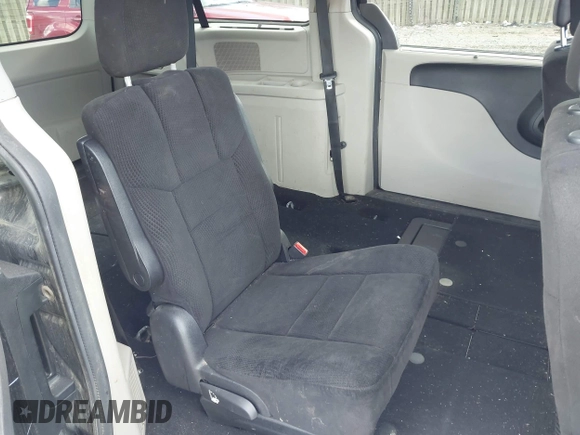 2013 Dodge Grand Caravan SXT with VIN 2C4RDGCG9DR563072, listed as a IAAI auction lot 42179166 with 211,008 mi miles and . Bid and sale history available at DreamBid. Image 8.