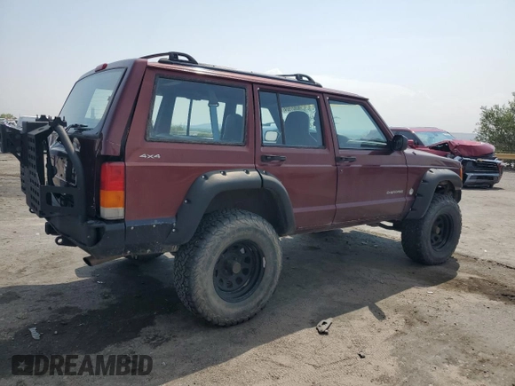2000 Jeep Cherokee SE with VIN 1J4FF28S9YL133208, listed as a Copart auction lot 63827924 with 0 mi miles and Salvage Title. Bid and sale history available at carsss.com. Image 3.