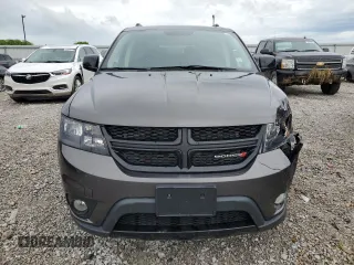 2017 Dodge Journey SXT z VIN 3C4PDCBG3HT516401, wystawiony jako Copart lot #56498445 z przebiegiem 65 156 mil mil oraz Szkoda całkowita • Salvage title. Historia ofert i sprzedaży dostępna na DreamBid. Obrazek 5.