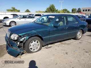 1997 Mercedes-Benz C with VIN WDBHA23EXVF507185, listed as a Copart auction lot 73716364 with 167,171 mi miles and Salvage title. Bid and sale history available at DreamBid. Image 1.