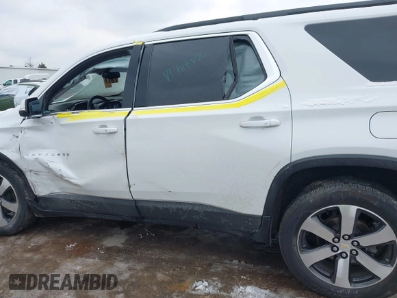 2021 Chevrolet Traverse LT with VIN 1GNERHKWXMJ218191, listed as a IAAI auction lot 41512332 with 87,206 mi miles and . Bid and sale history available at DreamBid. Image 14.