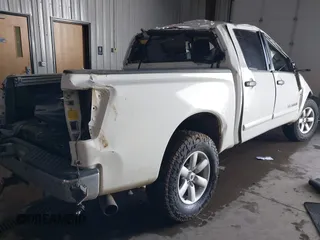 2013 Nissan Titan Pro-4X with VIN 1N6BA0EC7DN311469, listed as a IAAI auction lot 41945284 with 88,225 mi miles and . Bid and sale history available at DreamBid. Image 4.