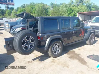 2021 Jeep Wrangler Unlimited Sport S with VIN 1C4HJXDG3MW801301, listed as a IAAI auction lot 42319387 with Not provided miles and . Bid and sale history available at DreamBid. Image 4.