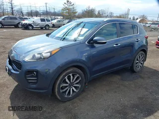 2018 Kia Sportage EX with VIN KNDPNCAC6J7385888, listed as a IAAI auction lot 41875250 with 139,022 mi miles and . Bid and sale history available at carsss.com. Image 2.