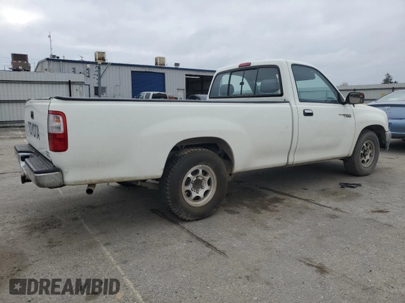1997 Toyota T100 with VIN JT4JM11D9V0019752, listed as a Copart auction lot 82449524 with 279,981 mi miles and Salvage Title. Bid and sale history available at DreamBid. Image 3.