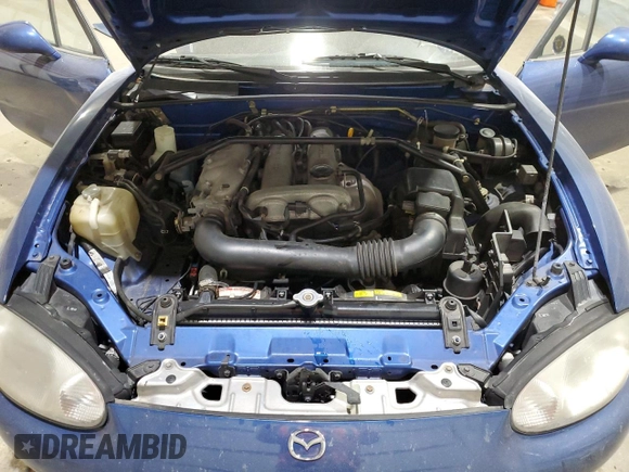 1999 Mazda MX-5 Miata with VIN JM1NB3532X0136645, listed as a Copart auction lot 59480265 with 160,936 mi miles and Clean title. Bid and sale history available at DreamBid. Image 11.