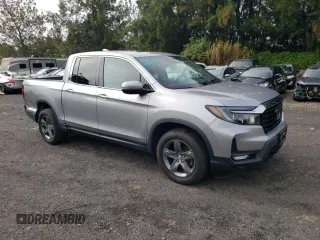 2022 Honda Ridgeline RTL-E z VIN 5FPYK3F70NB006044, wystawiony jako Copart lot #78291134 z przebiegiem 46 439 mil mil oraz Czysty tytuł • Clean title. Historia ofert i sprzedaży dostępna na DreamBid. Obrazek 4.