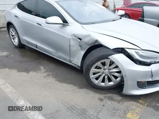 2016 Tesla Model S 90D with VIN 5YJSA1E23GF138925, listed as a IAAI auction lot 42408676 with 48,399 mi miles and . Bid and sale history available at DreamBid. Image 6.
