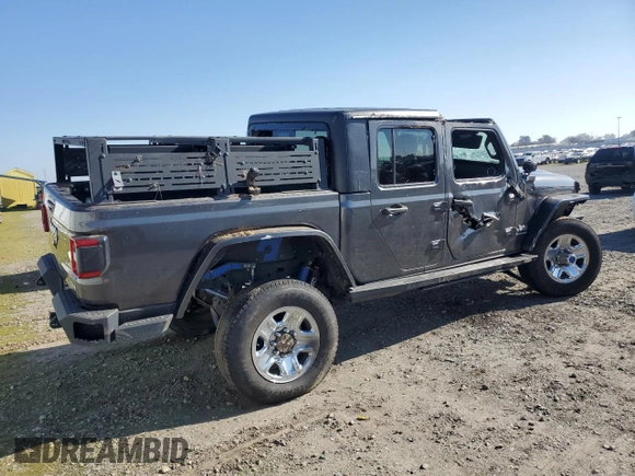 2020 Jeep Gladiator Overland с VIN 1C6HJTFG5LL131960, выставлен на аукционе Copart как лот 89385715 с пробегом 95 517 миль миль и Списание • Salvage title. История ставок и продаж доступна на DreamBid. Изображение 3.