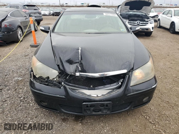 2007 Acura RL Technology z VIN JH4KB16697C002275, wystawiony jako Copart lot #82517284 z przebiegiem 200 857 mil mil oraz Czysty tytuł • Clean title. Historia ofert i sprzedaży dostępna na DreamBid. Obrazek 5.