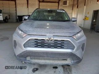 2019 Toyota RAV4 LE with VIN JTMG1RFV2KJ021318, listed as a Copart auction lot 46107385 with 57,863 mi miles and Salvage title. Bid and sale history available at DreamBid. Image 5.