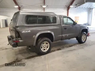 2003 Dodge Dakota z VIN 1D7GG16X23S204317, wystawiony jako Copart lot #54830745 z przebiegiem 139 508 mil mil oraz Szkoda całkowita • Salvage title. Historia ofert i sprzedaży dostępna na DreamBid. Obrazek 3.
