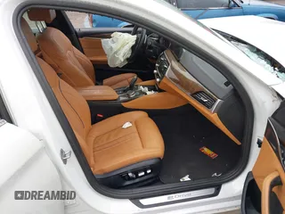 2018 BMW 5 Series 530e xDrive with VIN WBAJB1C50JG624043, listed as a IAAI auction lot 41814687 with 41,301 mi miles and . Bid and sale history available at DreamBid. Image 5.