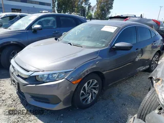 2016 Honda Civic EX with VIN 2HGFC2F74GH550780, listed as a IAAI auction lot 42135678 with 125,005 mi miles and . Bid and sale history available at DreamBid. Image 2.