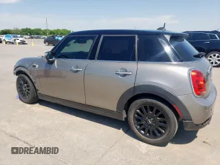 2017 MINI Hardtop 4 Door Cooper with VIN WMWXU1C53H2E18438, listed as a Copart auction lot 52871475 with 133,235 mi miles and Salvage Title. Bid and sale history available at DreamBid. Image 2.
