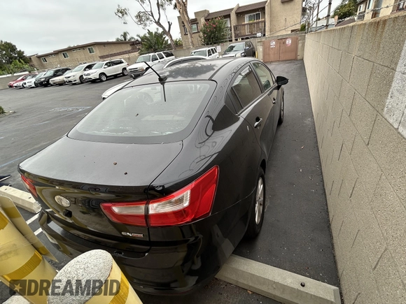 2013 Kia Rio EX with VIN KNADN4A3XD6150037, listed as a IAAI auction lot 42487891 with 150,999 mi miles and . Bid and sale history available at DreamBid. Image 4.