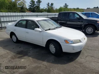 1997 Toyota Camry LE z VIN 4T1BG22KXVU163880, wystawiony jako Copart lot #56741295 z przebiegiem 132 863 mil mil oraz Szkody całkowita. Historia ofert i sprzedaży dostępna na DreamBid. Obrazek 4.