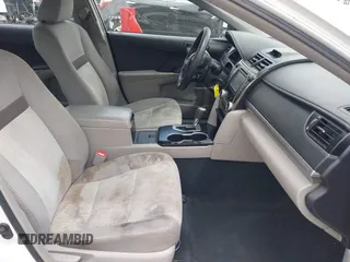 2014 Toyota Camry L with VIN 4T1BF1FK4EU403013, listed as a IAAI auction lot 42115089 with 221,686 mi miles and . Bid and sale history available at DreamBid. Image 5.