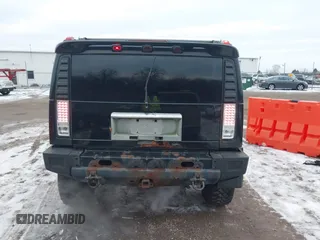 2003 Hummer H2 with VIN 5GRGN23UX3H106356, listed as a IAAI auction lot 41185603 with Not Provided miles. Bid and sale history available at carsss.com. Image 16.