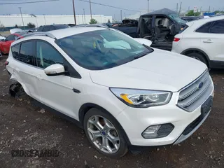 2019 Ford Escape Titanium with VIN 1FMCU9J97KUA03195, listed as a IAAI auction lot 42656589 with 40,099 mi miles and . Bid and sale history available at DreamBid. Image 1.
