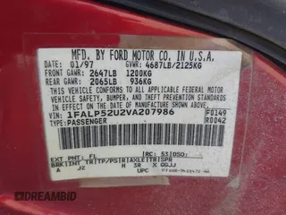 1997 Ford Taurus GL z VIN 1FALP52U2VA207986, wystawiony jako IAAI lot #41606014 z przebiegiem 225 124 mil mil oraz . Historia ofert i sprzedaży dostępna na DreamBid. Obrazek 9.