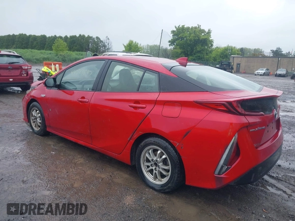 2021 Toyota Prius LE with VIN JTDKAMFP7M3178008, listed as a IAAI auction lot 42273697 with 110,605 mi miles and . Bid and sale history available at DreamBid. Image 3.