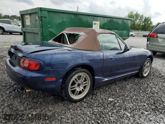 2003 Mazda MX-5 Miata Cloth with VIN JM1NB353230312023, listed as a Copart auction lot 53968875 with 174,252 mi miles and Salvage title. Bid and sale history available at DreamBid. Image 3.