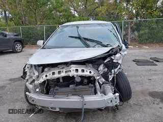 2008 Toyota Yaris with VIN JTDBT923881283264, listed as a IAAI auction lot 41622435 with 174,689 mi miles. Bid and sale history available at carsss.com. Image 12.