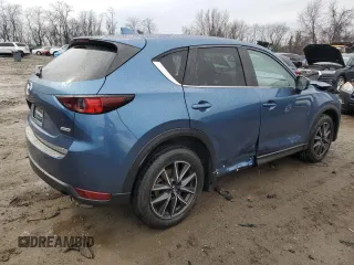 2018 Mazda CX-5 Touring with VIN JM3KFBCM0J0363036, listed as a Copart auction lot 47085755 with 61,928 mi miles and Salvage Title. Bid and sale history available at DreamBid. Image 3.